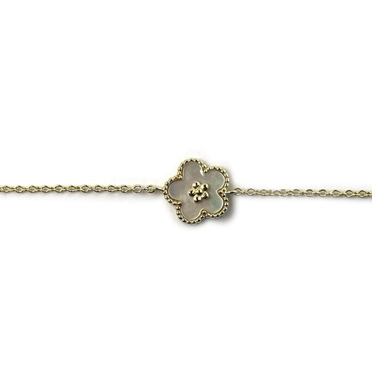 Pulsera de plata con baño de oro amarillo con flor de madreperla