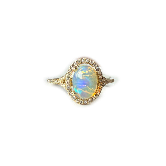 Anillo en oro amarillo 10k con ópalo y diamantes 0.25ctw