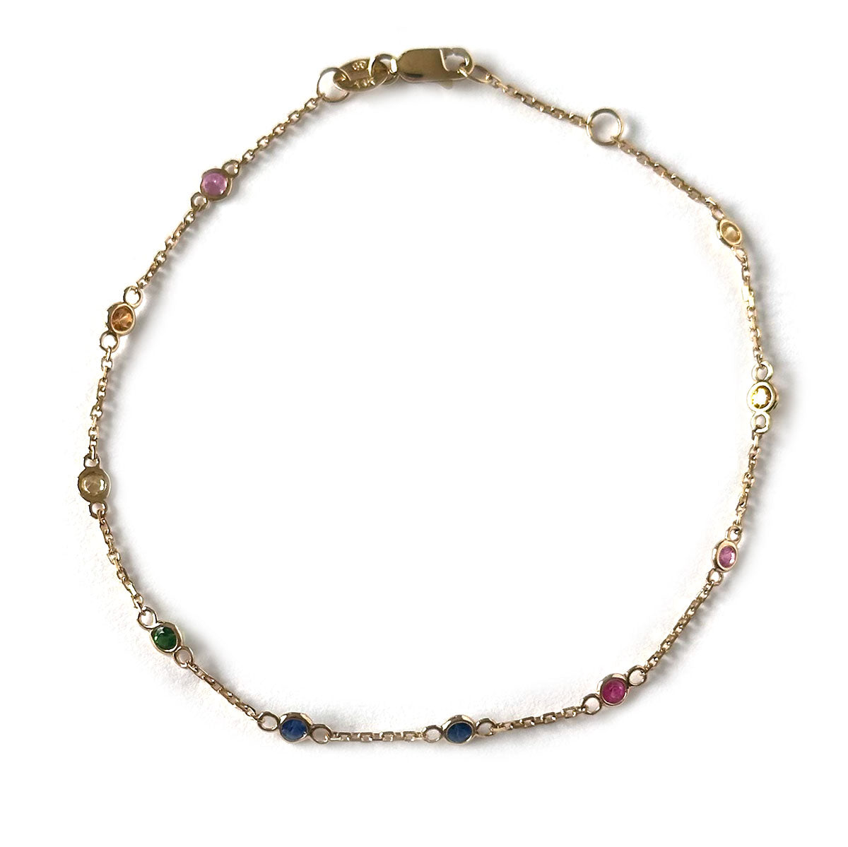 Pulsera en oro amarillo 14k con estaciones de piedras naturales en los colores del arcoíris