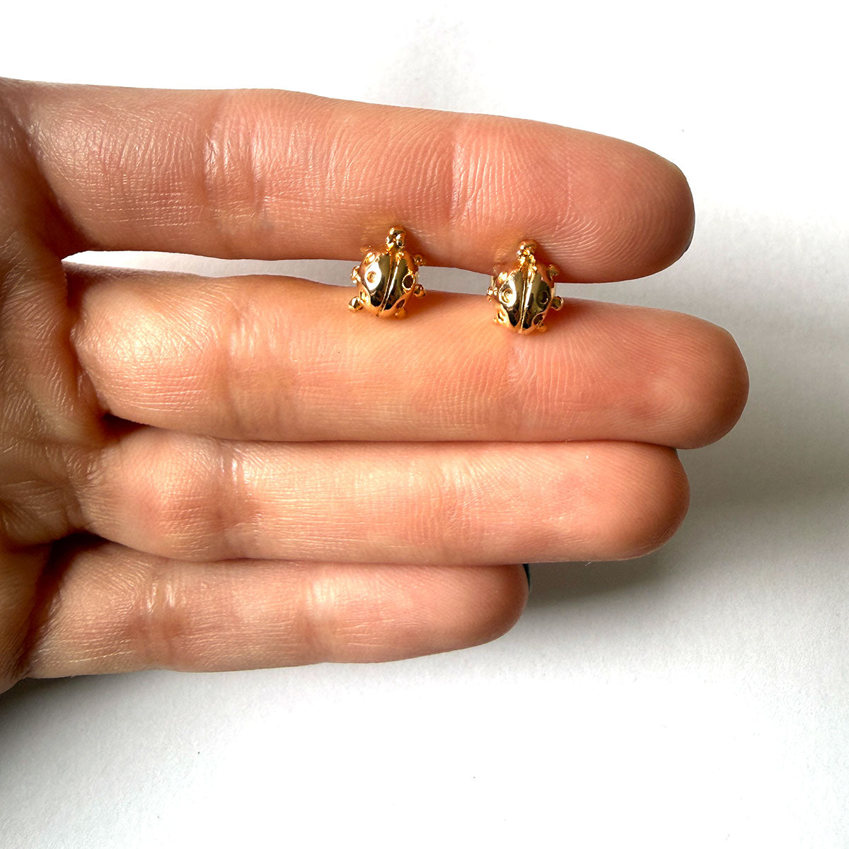 Aretes de mariquitas en plata con baño de oro
