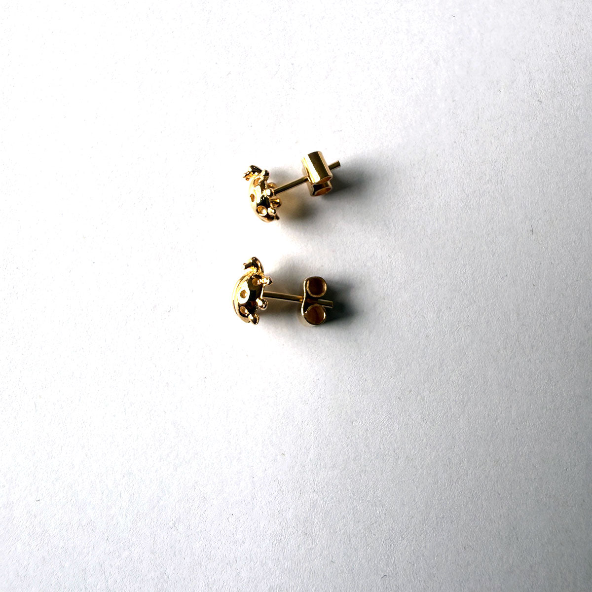 Aretes de mariquitas en plata con baño de oro