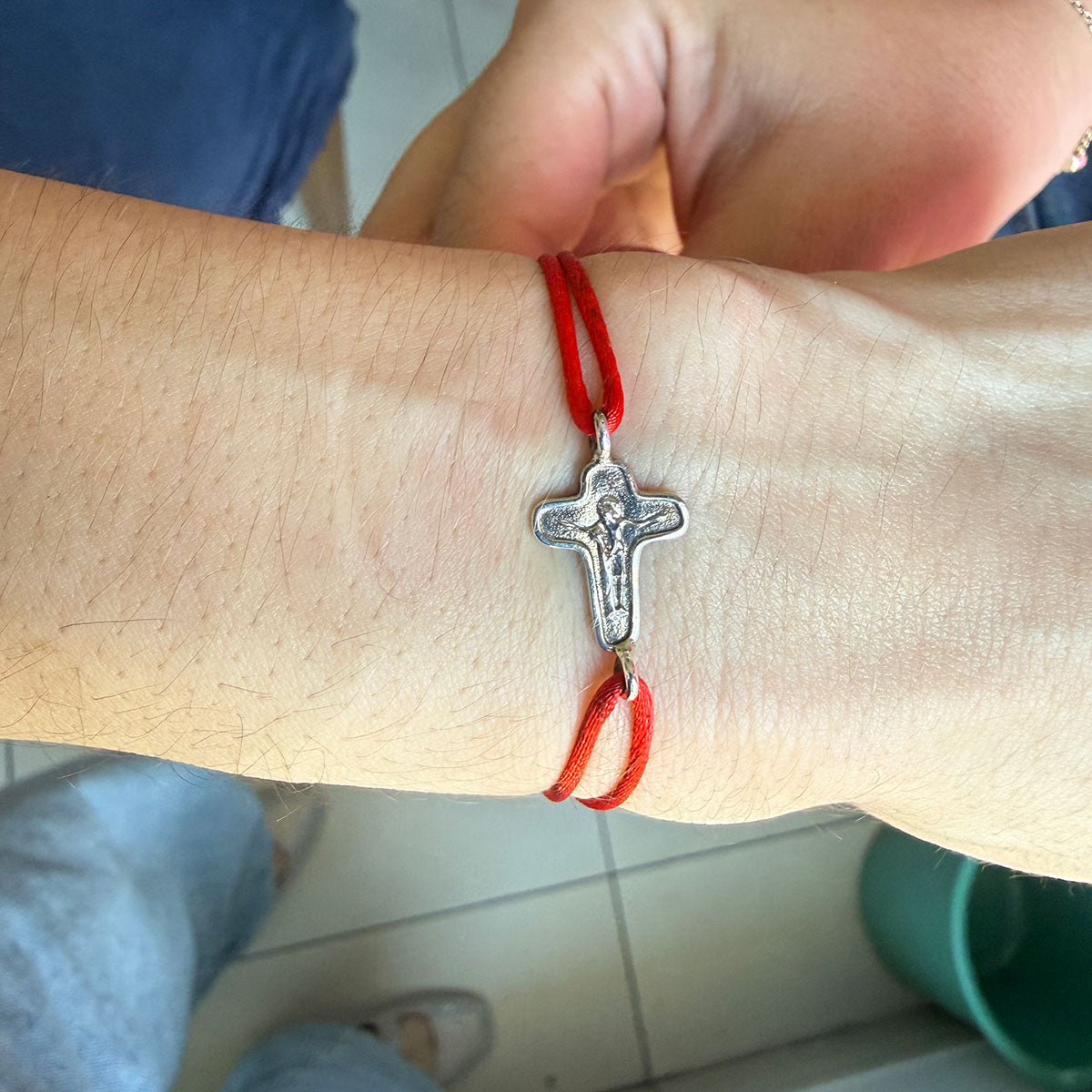 Pulsera cordón con cruz de la unidad en plata