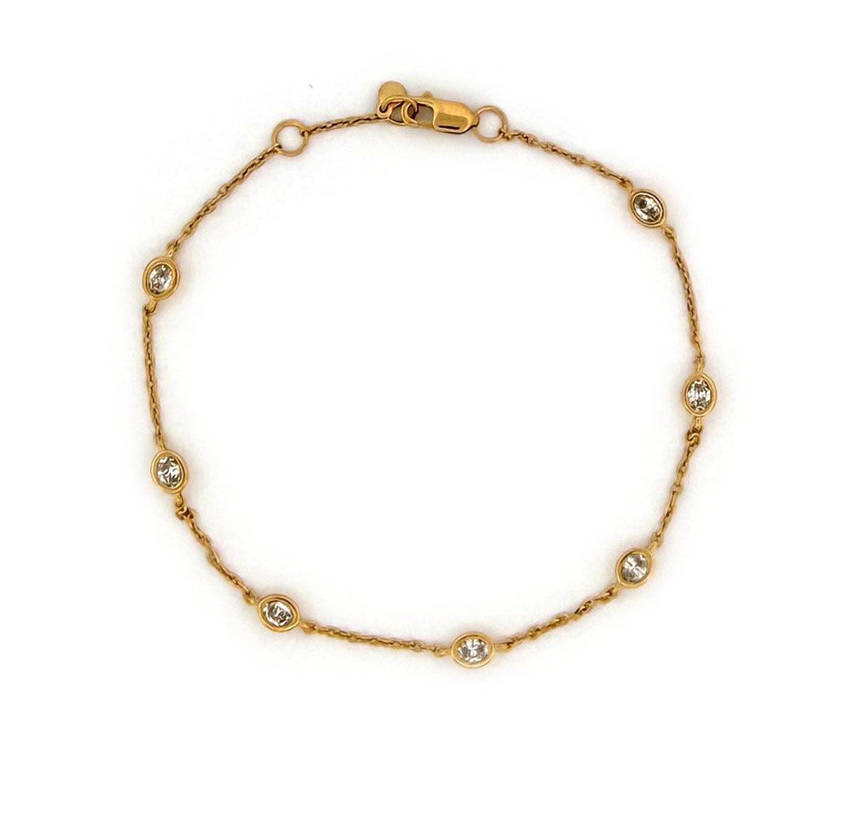 Pulsera de plata en baño de oro amarillo con diamantes ovalados de laboratorio 0.50ctw