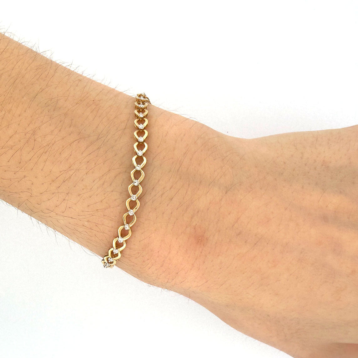 Pulsera en oro amarillo 10K de eslabones con diamantes en el medio 0.20ctw