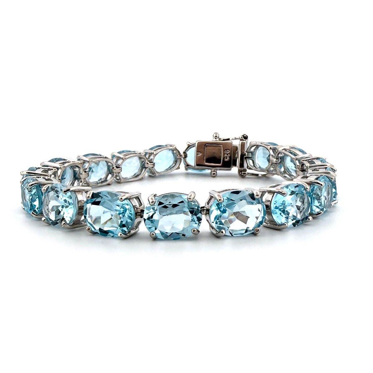Pulsera tenis de plata con topacios azules 40ctw