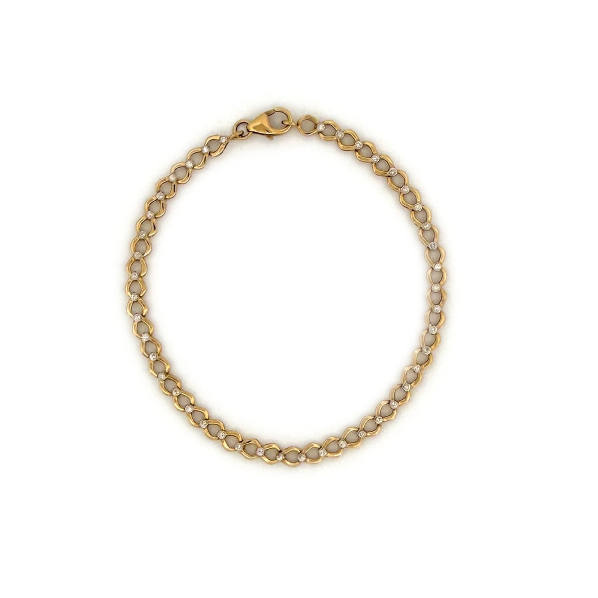 Pulsera en oro amarillo 10K de eslabones con diamantes en el medio 0.20ctw