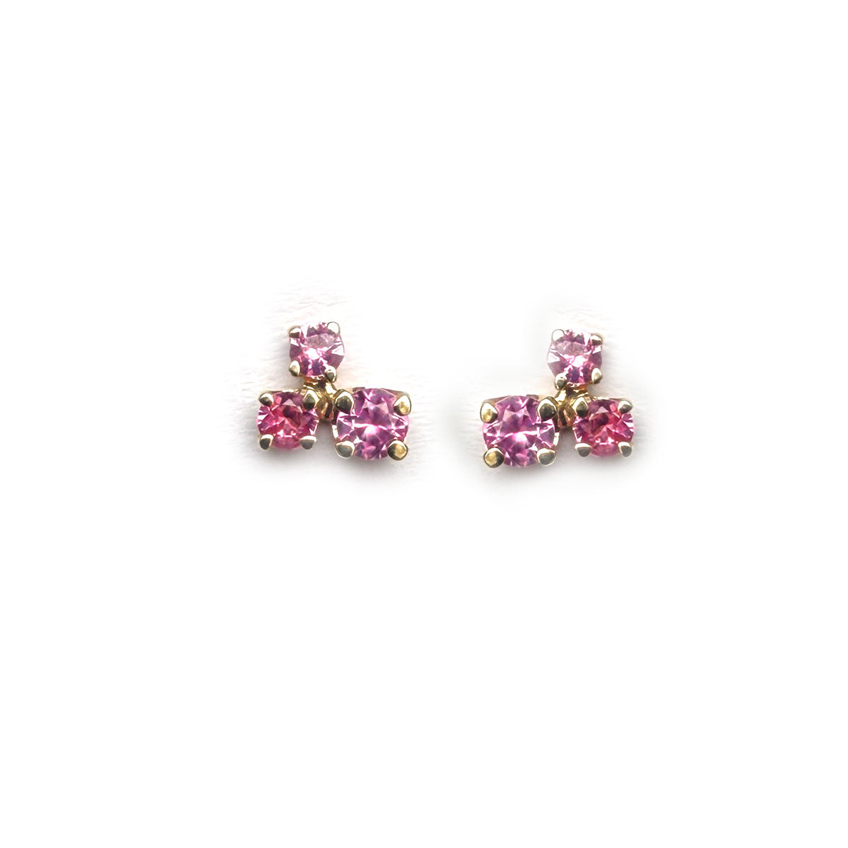 Aretes en oro blanco 14K con tres zafiros rosa redondos