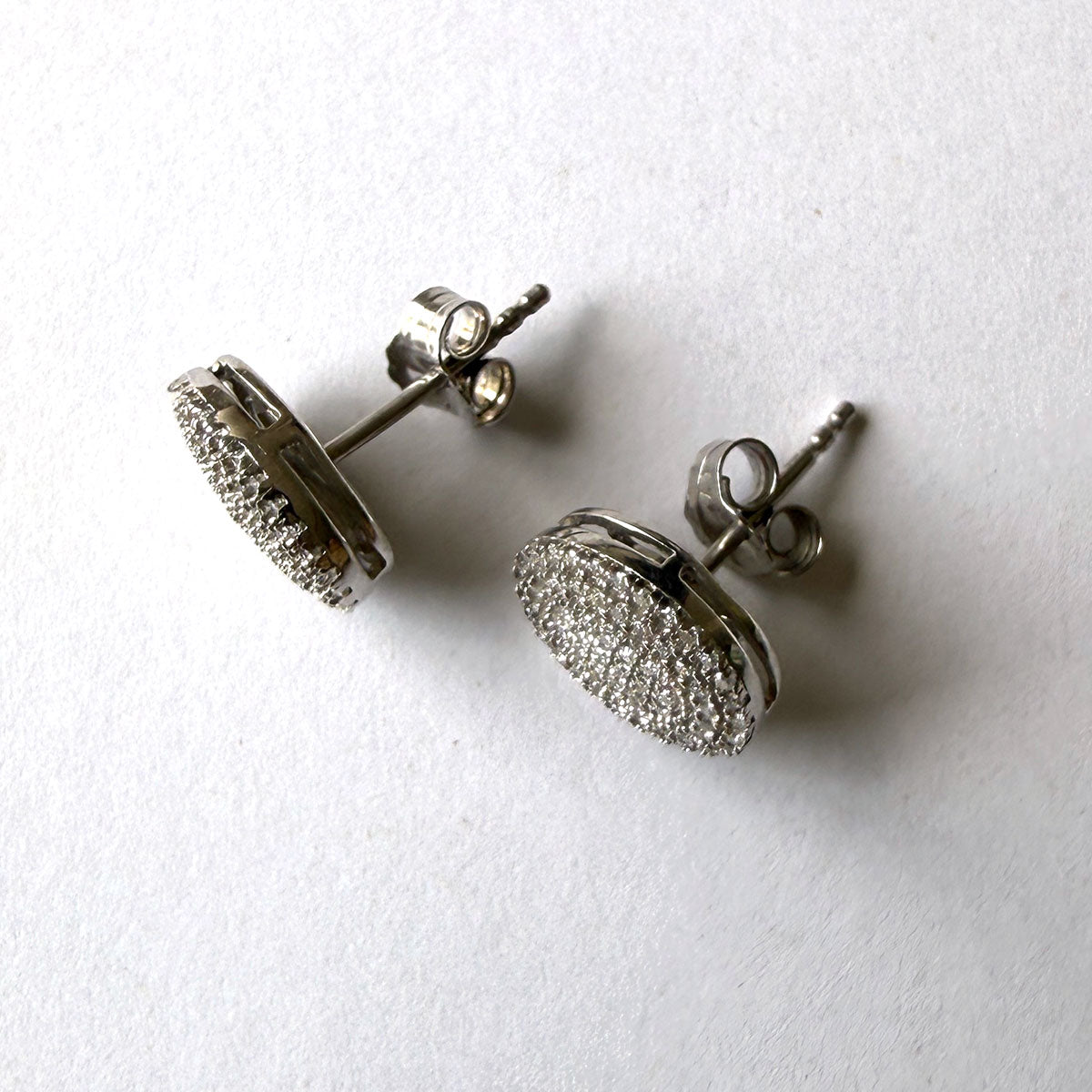 Aretes en plata ovalados con diamantes 0.25ctw