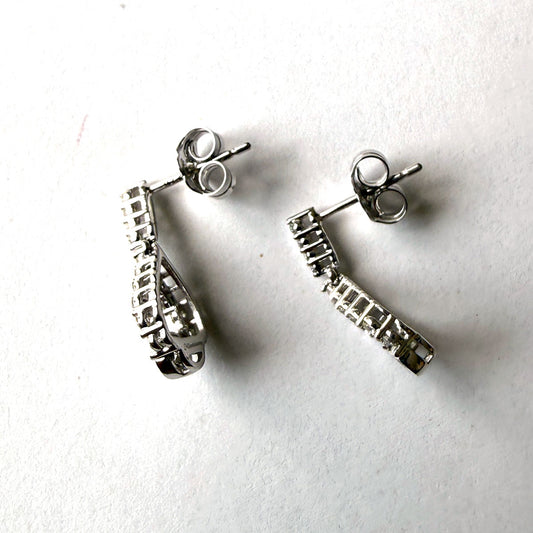 Aretes en oro blanco 10K con gota abierta colgante de diamantes 0.25ctw