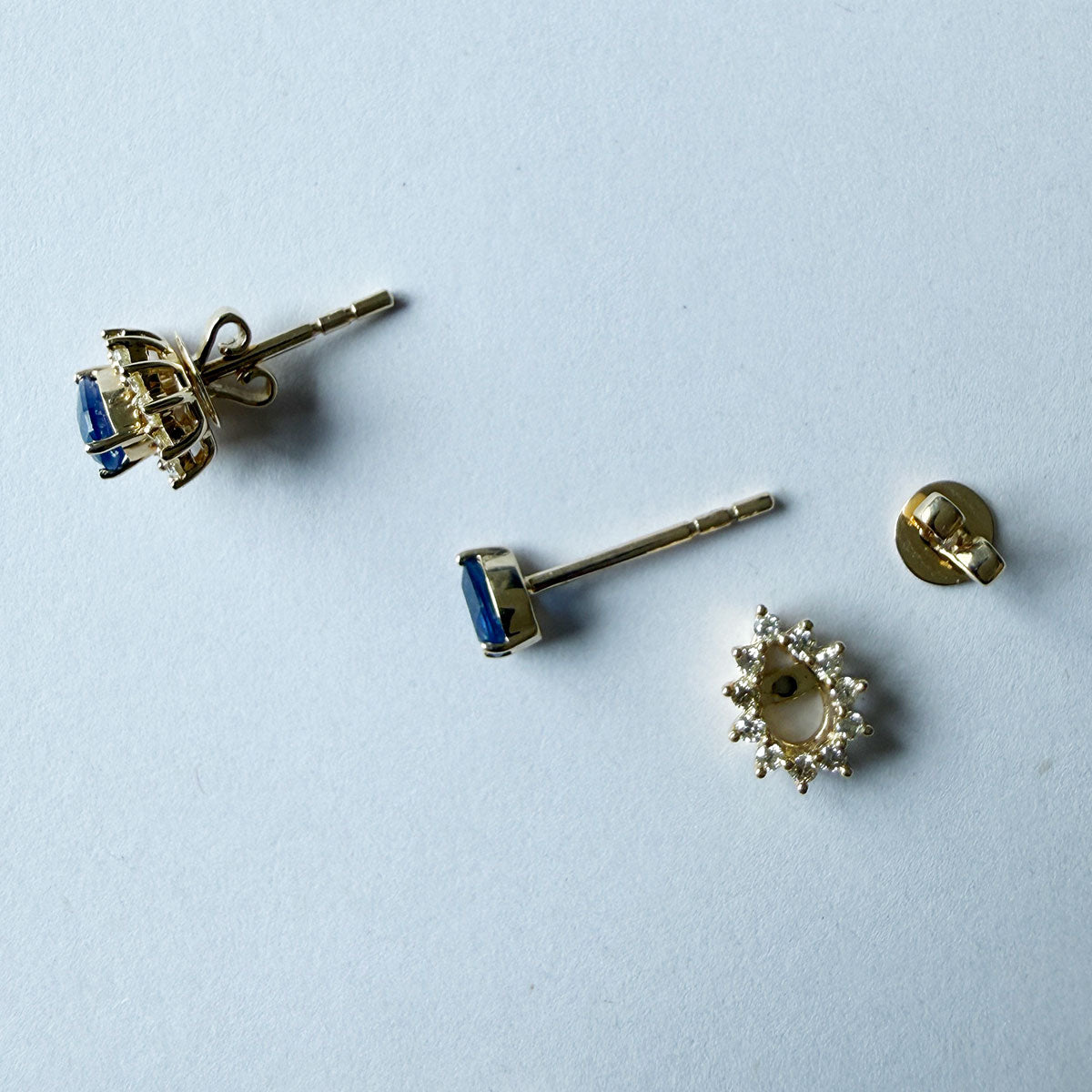 Aretes en oro amarillo 14K con zafiro corte pera y halo de diamantes 0.40ctw convertible