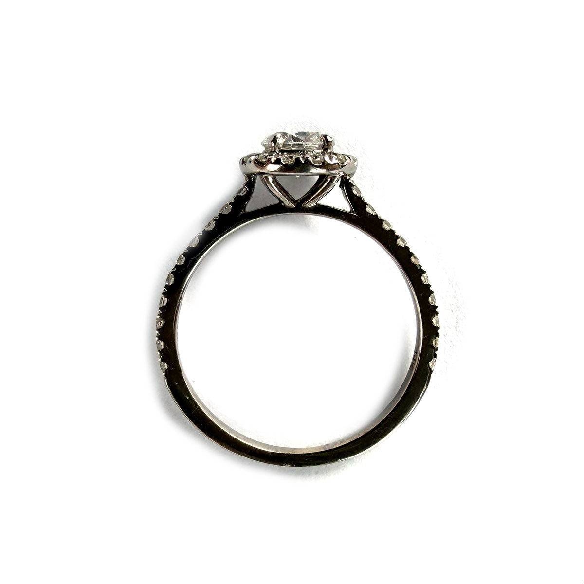 Anillo de compromiso en oro blanco 14k con diamante central redondo 0.33ct y Halo. Total en Diamantes 0.53ctw (SI2)
