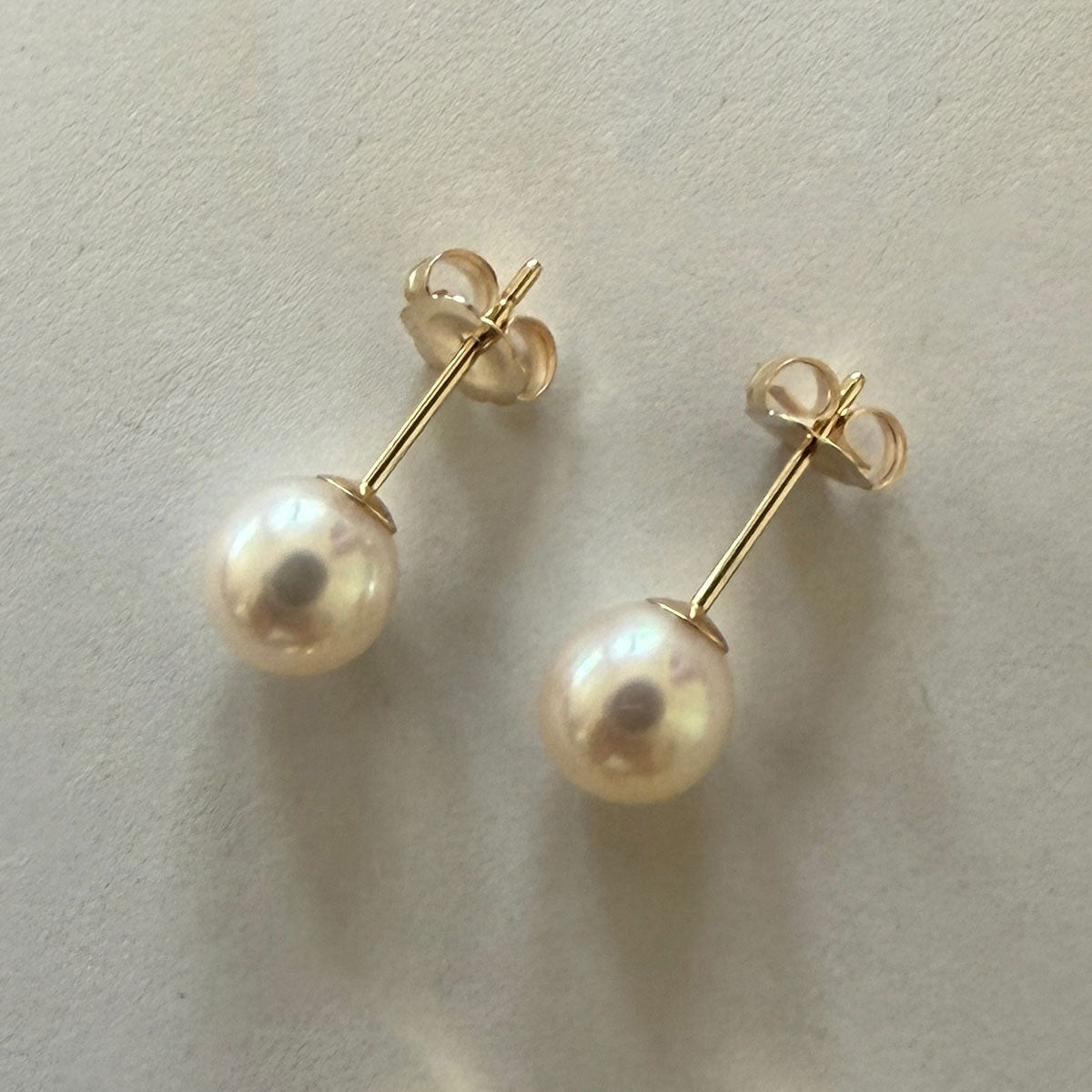 Aretes en oro amarillo 14K y perlas