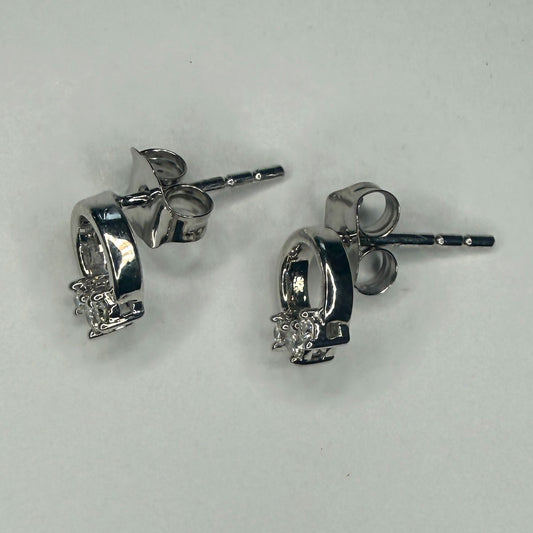 Aretes en plata mini círculo con tres diamantes 0.10ctw