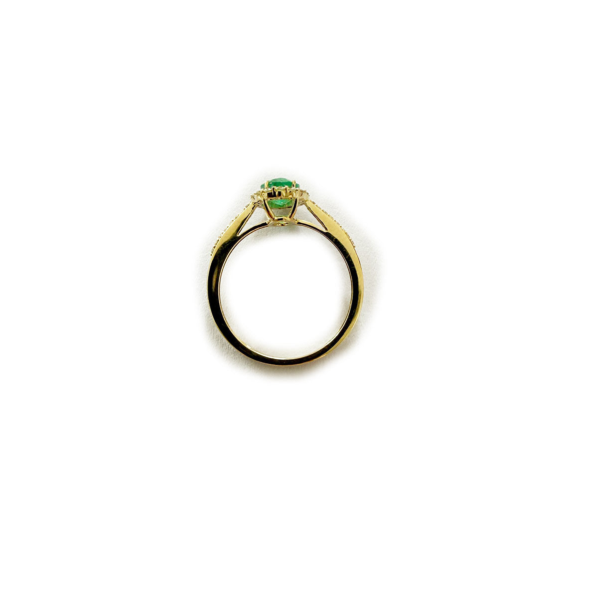 Anillo amarillo 10K con esmeralda ovalada y halo de diamantes 0.25ctw