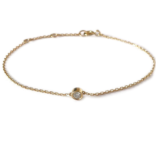 Pulsera de plata con baño oro amariillo con diamante biselado 0.20ct