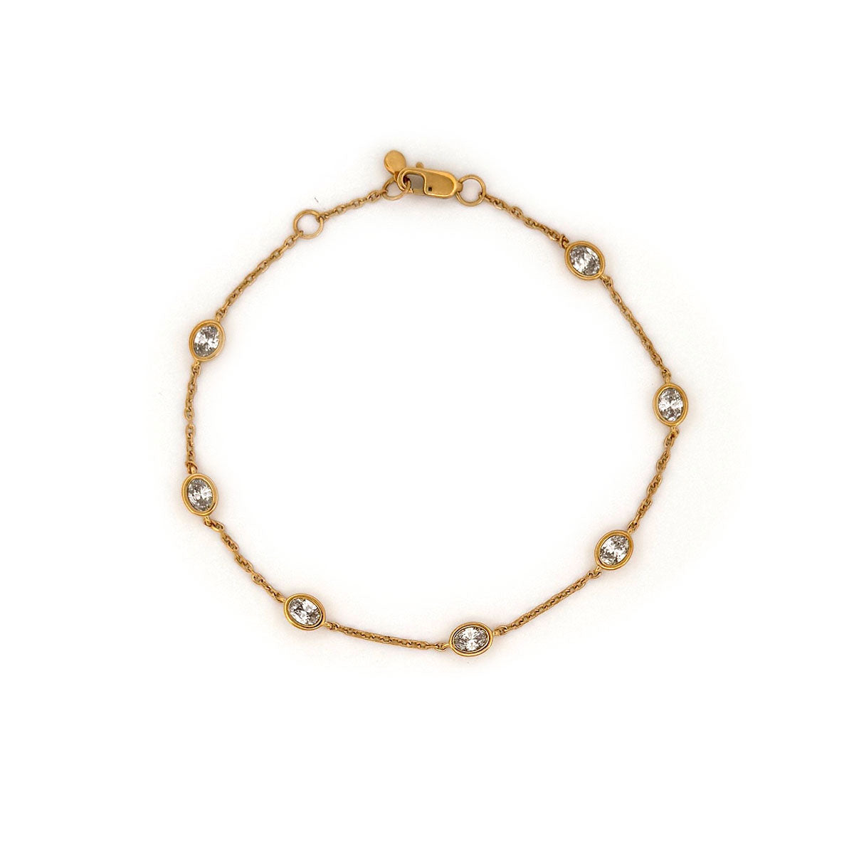 Pulsera de plata en baño de oro amarillo con diamantes ovalados de laboratorio 1ctw
