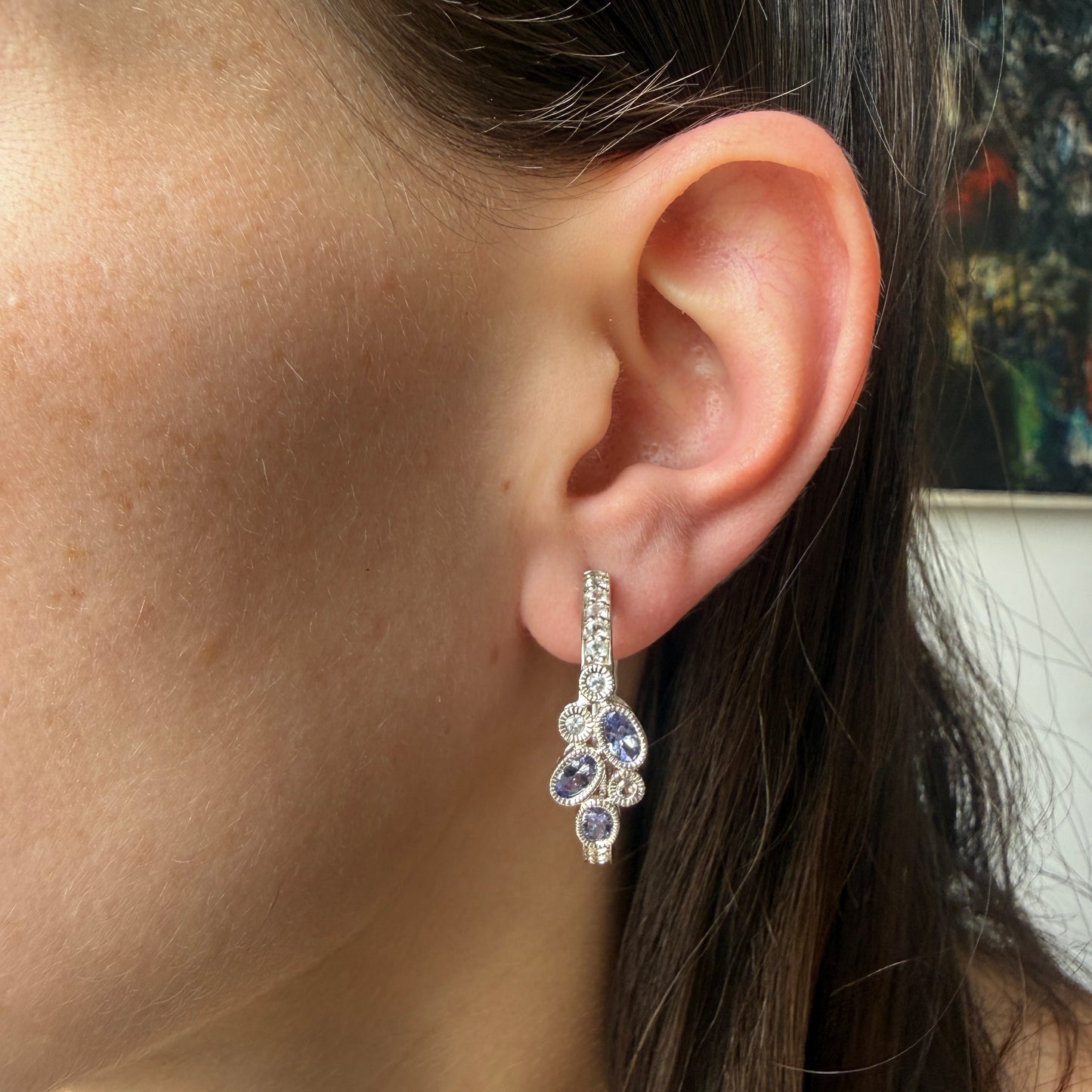 Argollas de plata con tanzanitas y topacios blancos