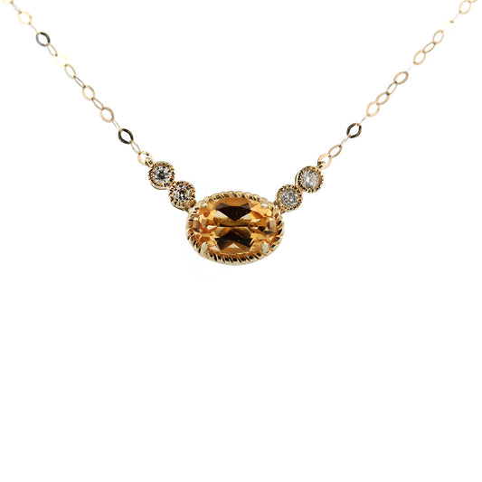 Collar en oro amarillo 10K con citrino ovalado y diamantes 0.08ctw