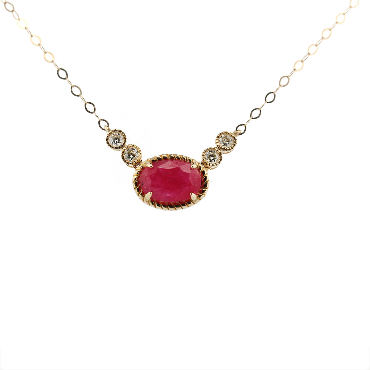 Collar en oro amarillo 10K con rubí ovalado y diamantes 0.08ctw