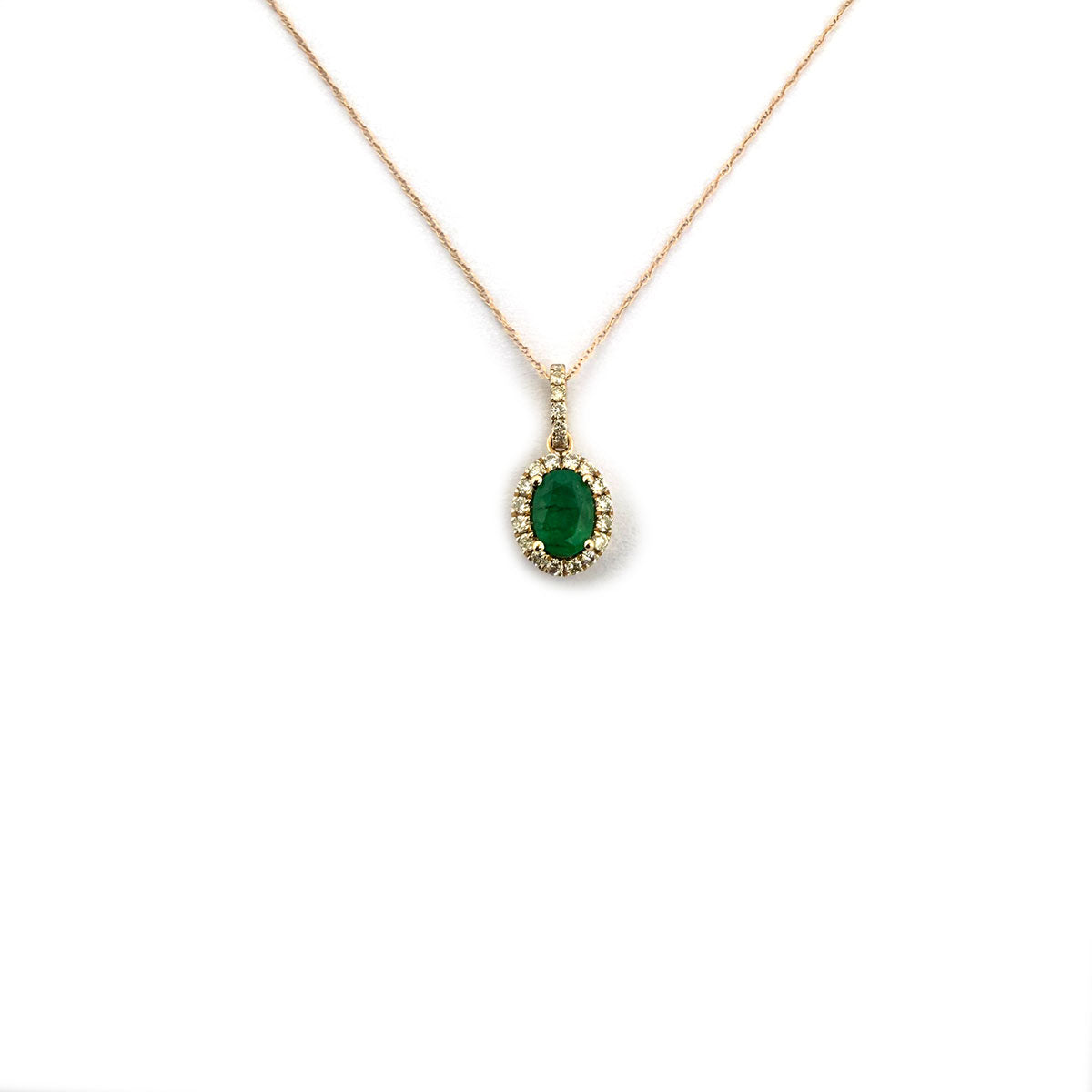 Collar en oro amarillo 10K con dije de esmeralda ovalada con halo y pasa cadenas de diamantes 0.30ctw
