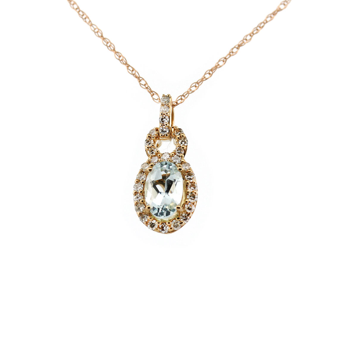Collar en oro amarillo 10k con aguamarina ovalada con pasacadena y halo de diamantes 0.18ctw