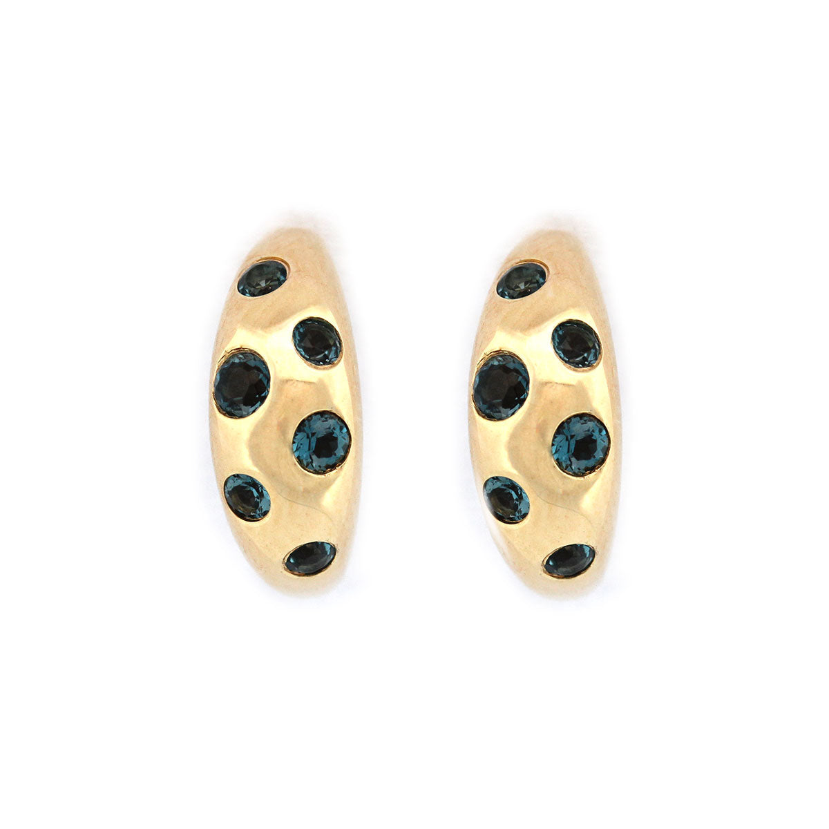 Aretes en plata con baño de oro y topacio london blue incrustados