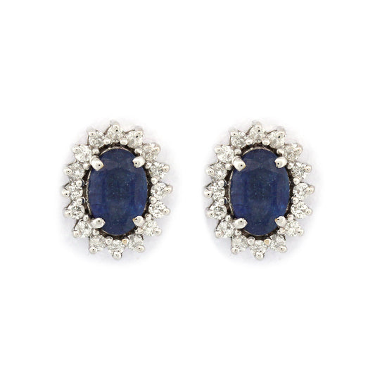 Aretes de oro blanco 14k con zafiros ovalados 1.25ctw y halo de diamantes 0.23ctw