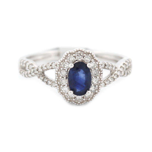 Anillo en oro blanco 14K con zafiro ovalado y diamantes 0.25ctw
