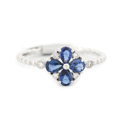 Anillo en blanco 14K con flor de zafiros y diamantes 0.18ctw en aro de bolitas