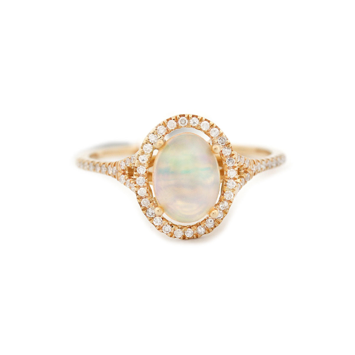 Anillo en oro amarillo 10k con ópalo y diamantes 0.25ctw