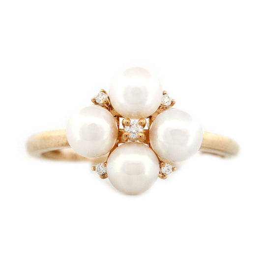 Anillo en oro amarillo 14K con flor de perlas y diamantes 0.05ctw