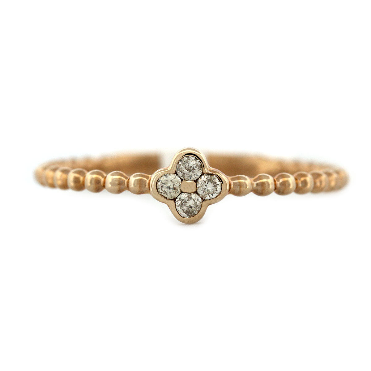 Anillo en oro amarillo 10k de bolitas con mini flor de diamantes 0.10ctw