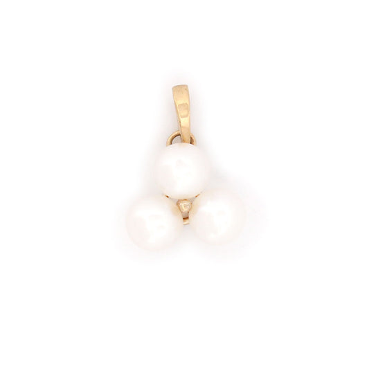 Dije de oro amarillo 14k con tres perlas