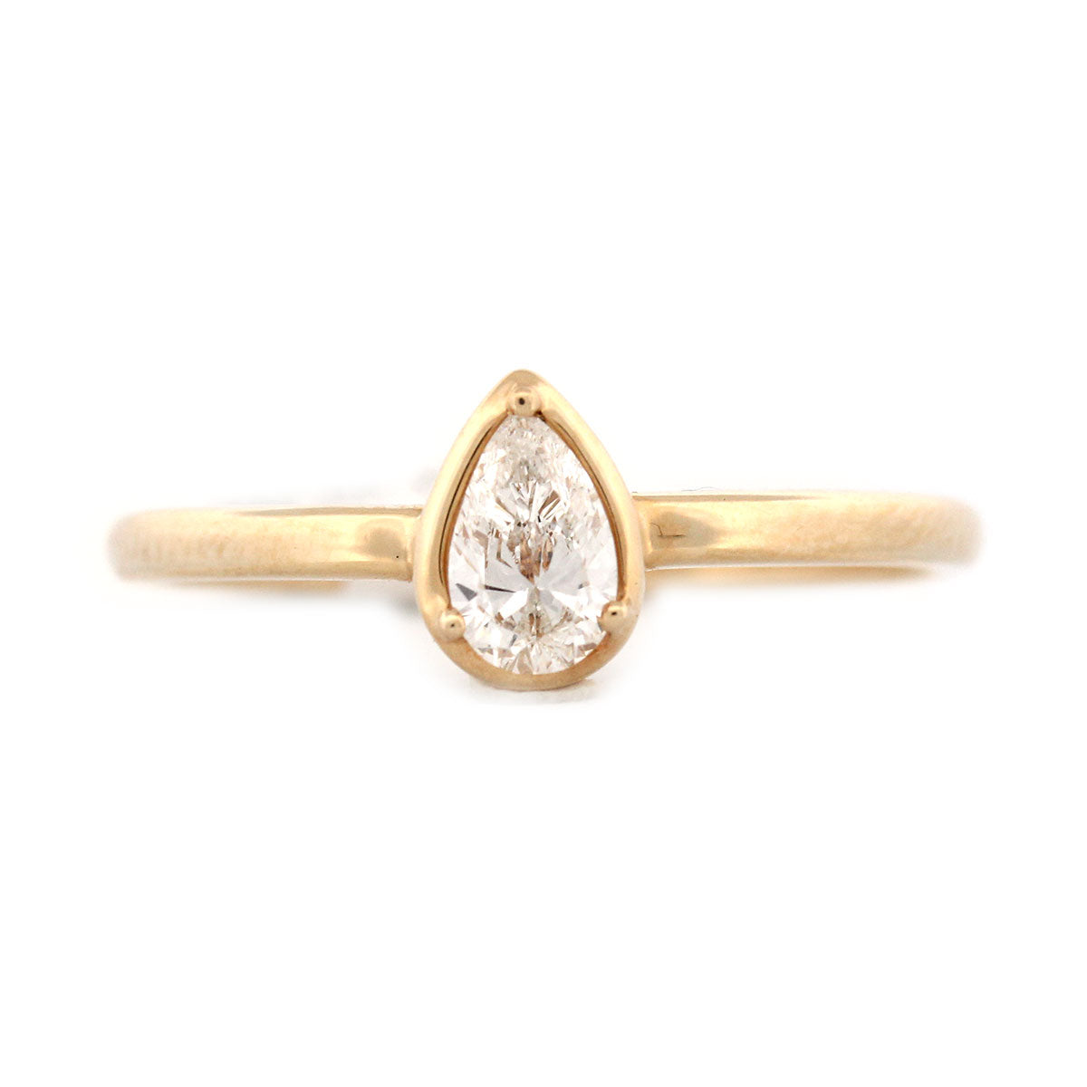 Anillo en oro amarillo 14K con diamante corte pera 0.33ctw
