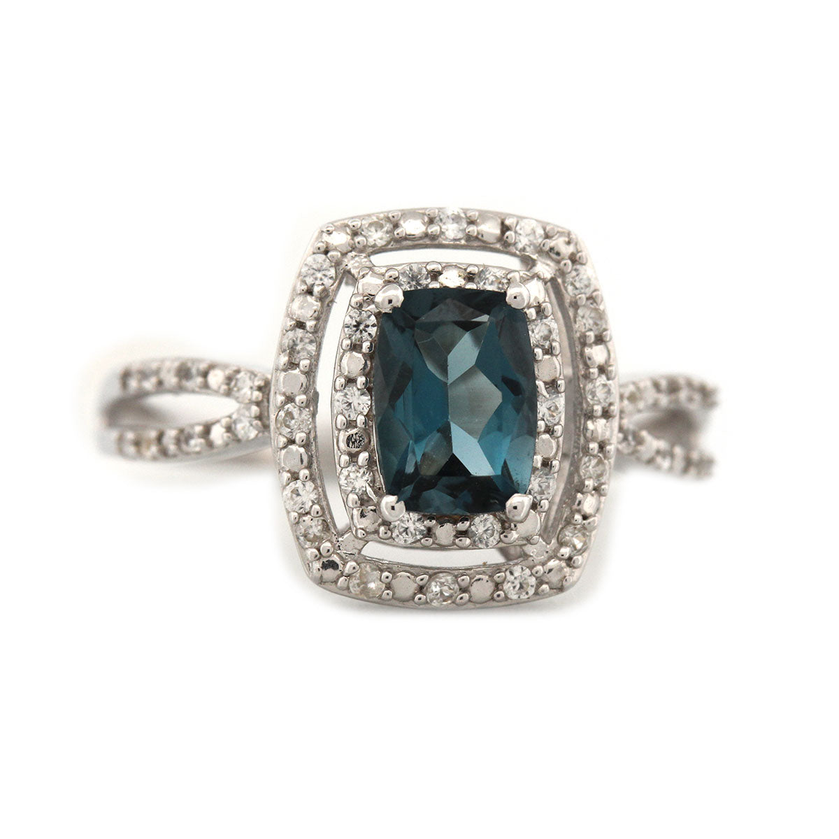 Anillo de plata con topacio London blue y doble halo de topacios blancos