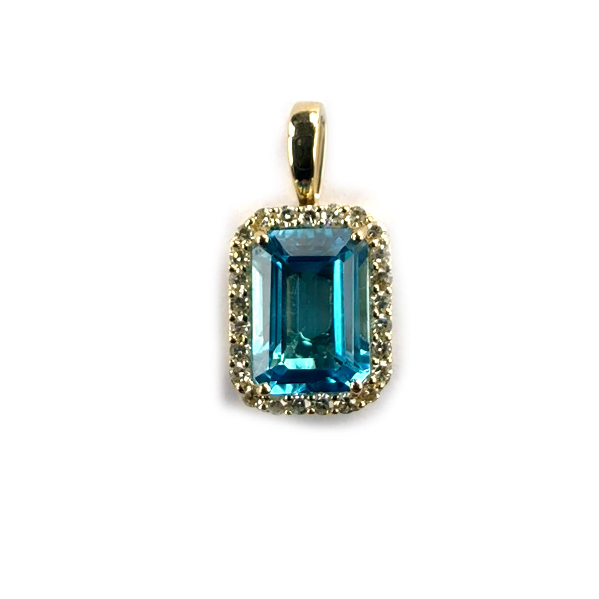 Dije en oro amarillo 14K con topacio azul 1.5ct y halo de diamantes 0.13ctw