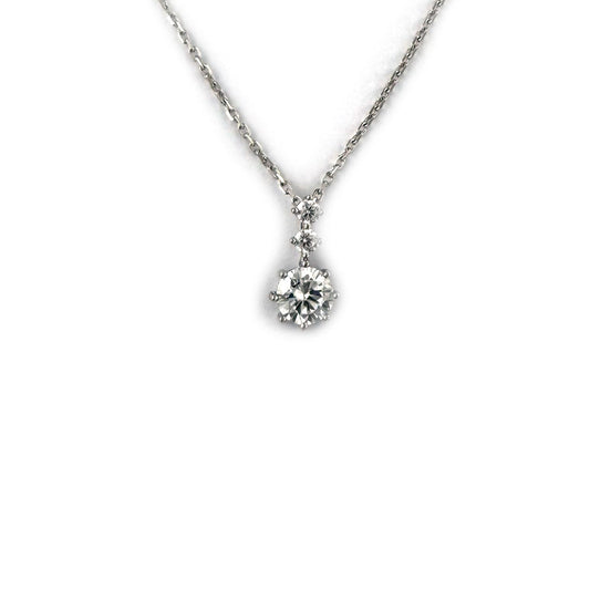 Collar de plata con baño de platino y dije de tres circonitas redondas