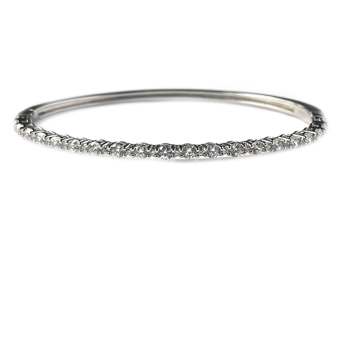 Pulsera dura de plata con linea de circonitas grandes y pequeñas