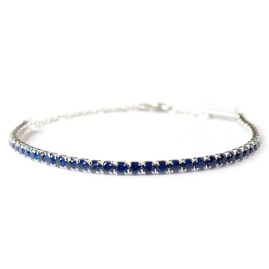 Pulsera de plata con baño de platino con circonitas azules