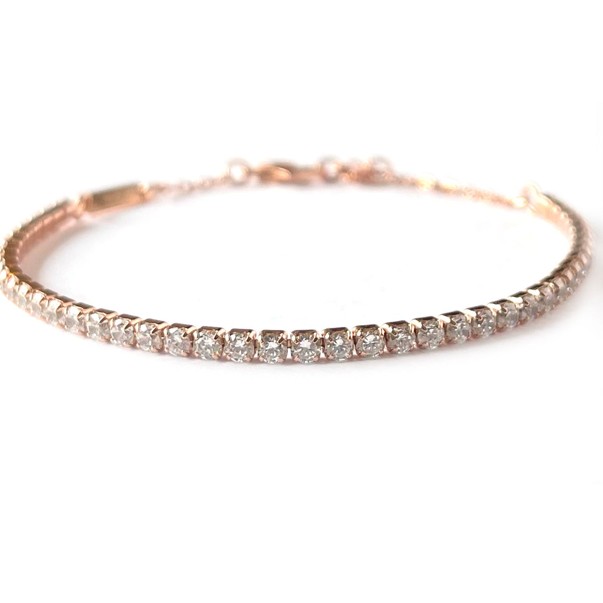 Pulsera de plata con baño de oro rosa con circonitas blancas