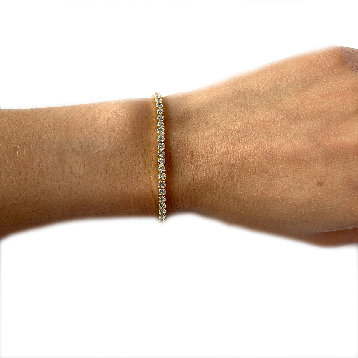 Pulsera de plata con baño de oro amarillo con circonitas blancas