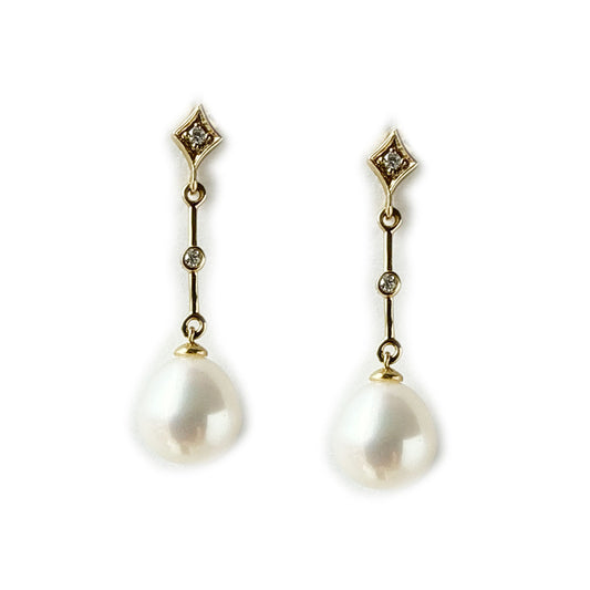 Aretes largos de oro amarillo 14K con perla y diamantes 0.05ctw
