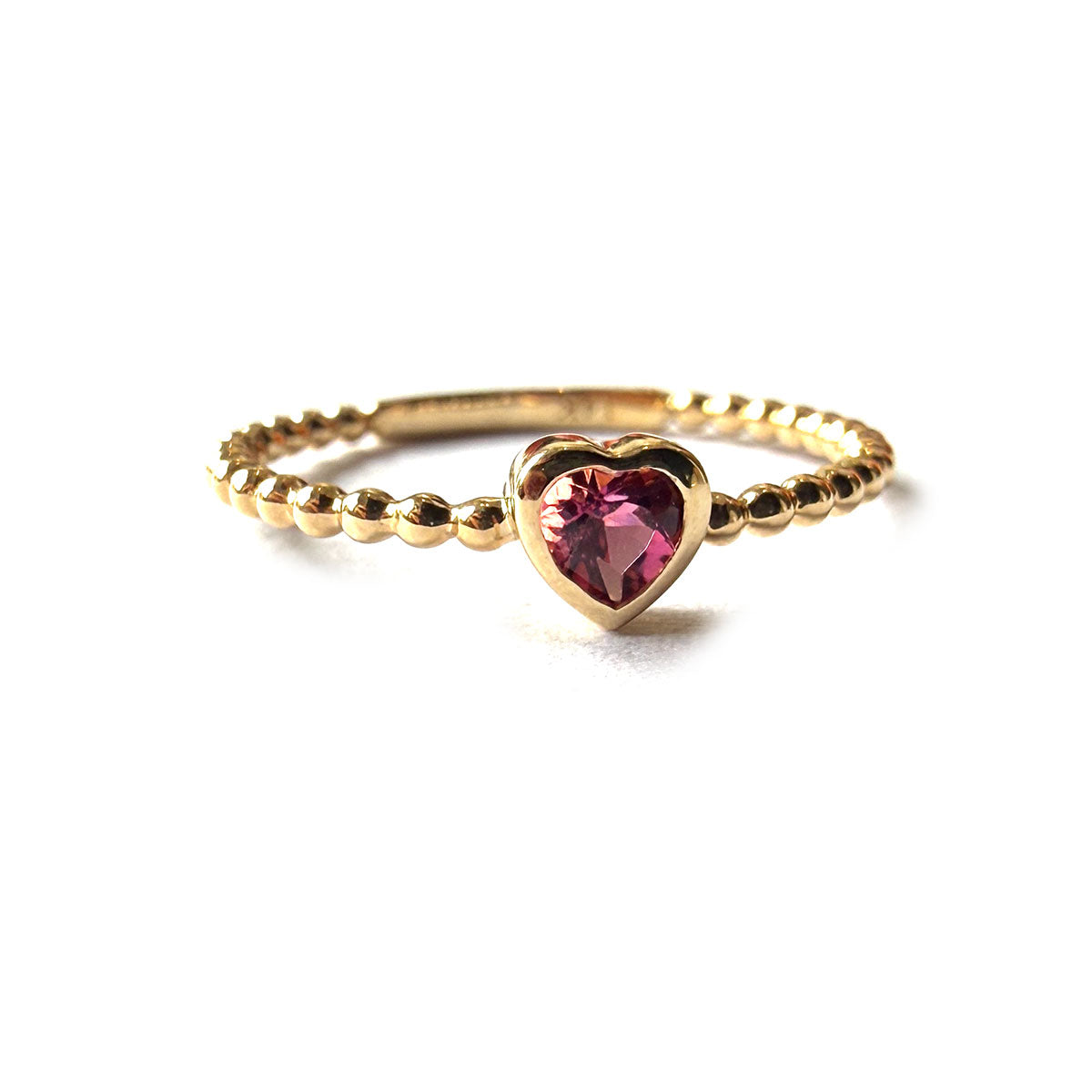 Anillo en oro amarillo 14k con aro de bolitas y turmalina rosa corazón 0.16ct