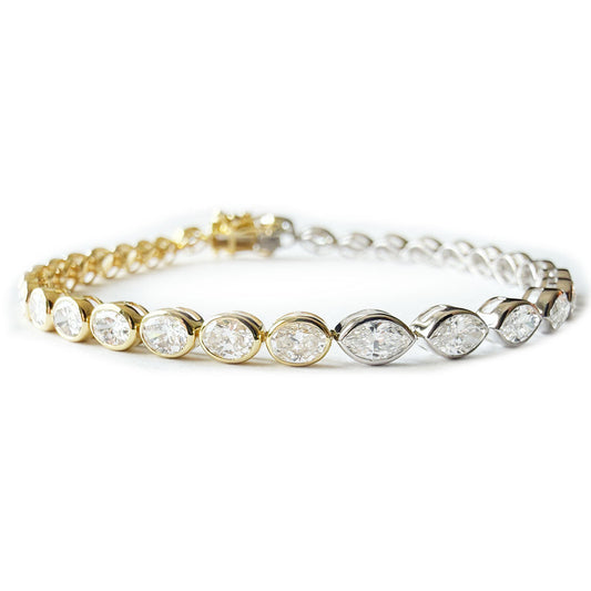 Pulsera tenis de oro blanco y amarillo 14k con diamantes de laboratorio ovalados y marquesas 4.73ct
