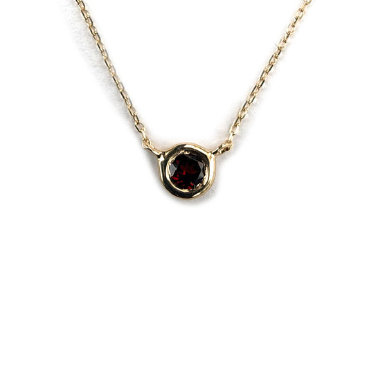 Collar en oro amarillo 14K con granate biselado