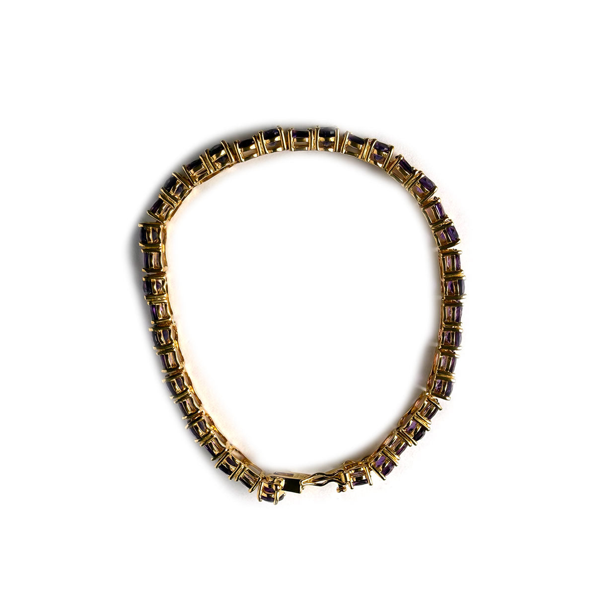 Pulsera de plata con baño de oro amarillo y amatistas ovaladas