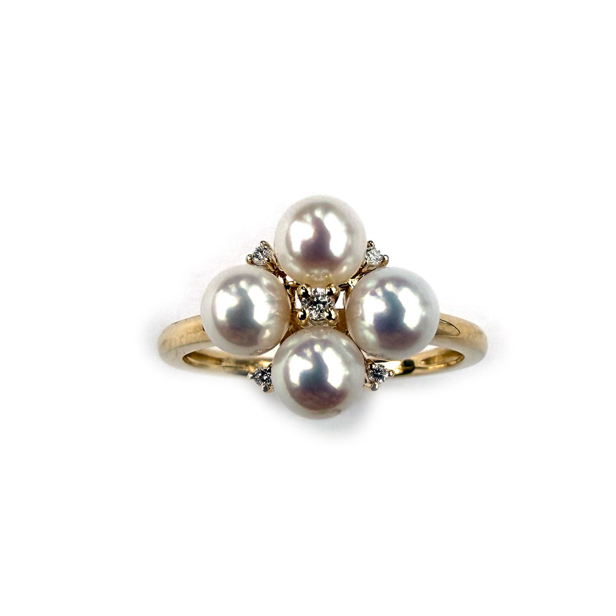 Anillo en oro amarillo 14K con flor de perlas y diamantes 0.05ctw