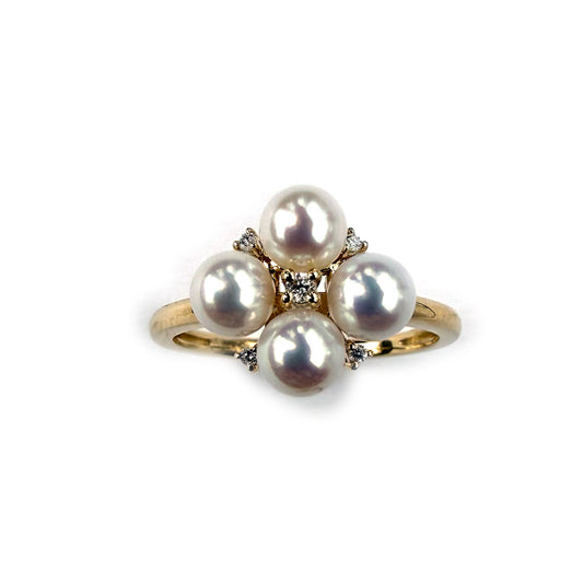 Anillo en oro amarillo 14K con flor de perlas y diamantes 0.05ctw
