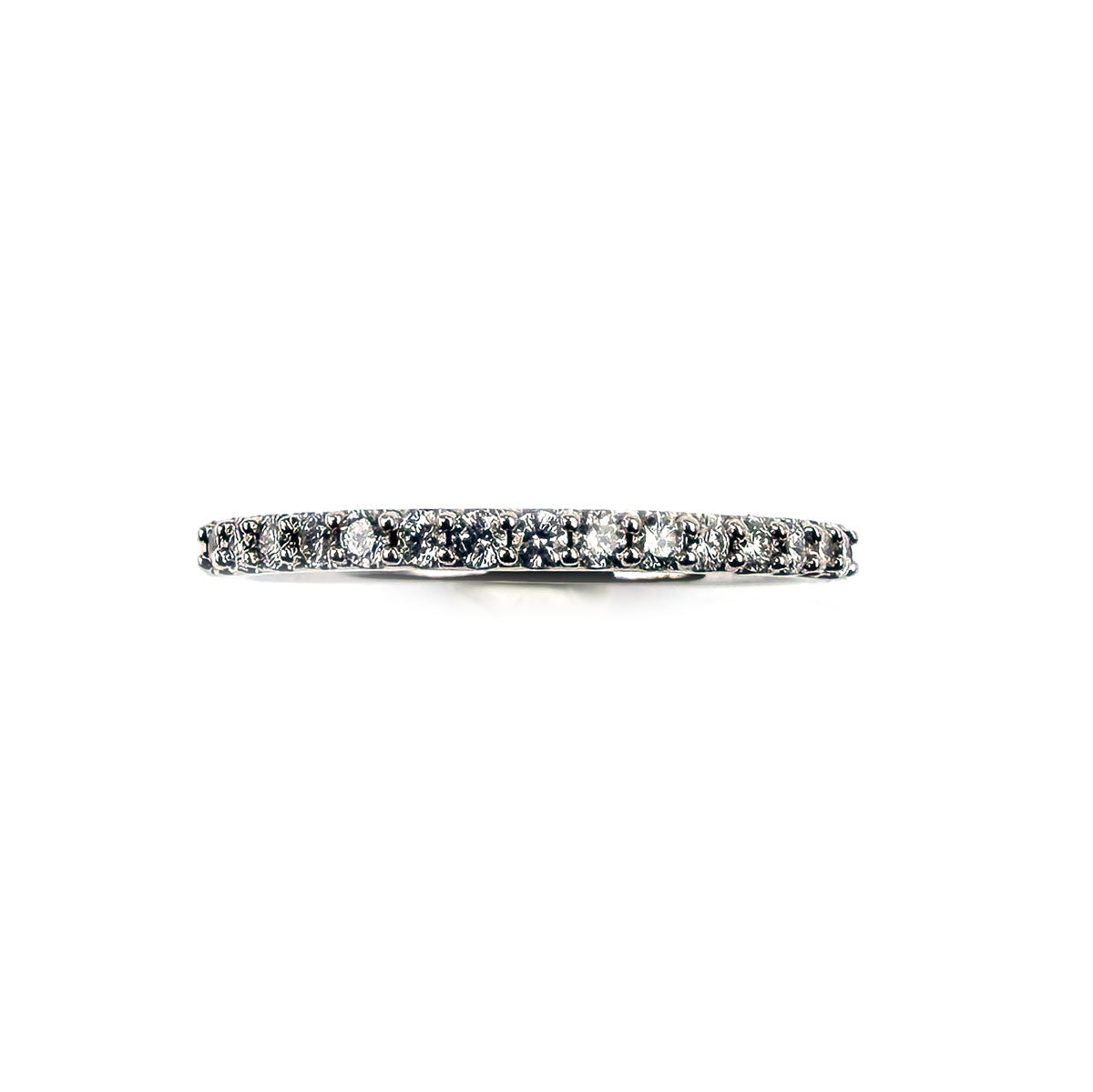 Anillo medio cintillo en oro blanco 10K con diamantes 0.25ctw