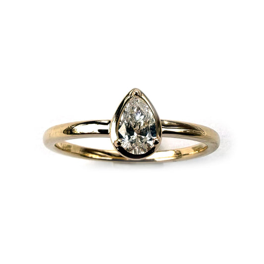 Anillo en oro amarillo 14K con diamante corte pera 0.33ctw
